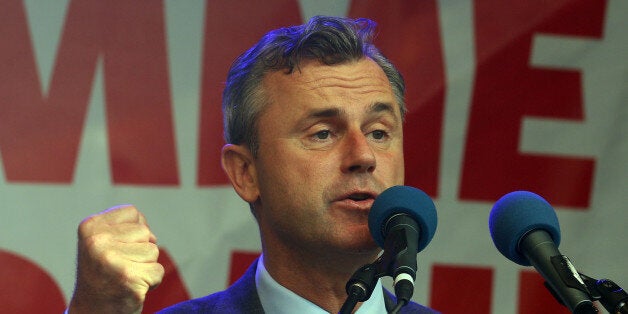 FILE - In this May 20, 2016 file photo Norbert Hofer candidate for presidential elections of Austria's right-wing Freedom Party, FPOE, speaks to supporters during the final election campaign event in Vienna, Austria. (AP Photo/Ronald Zak, File)