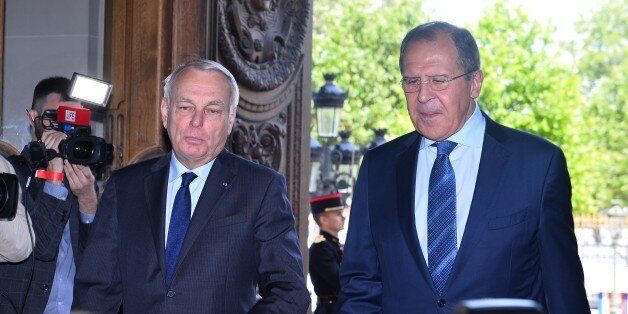 PARIS, FRANCE - JUNE 29: Russia's Foreign Minister Sergey Lavrov (R) and French Foreign Minister Jean-Marc Ayrault (L) arrive a press conference after their meeting in Paris, France on June 29, 2016. (Photo by Mustafa Yalcin/Anadolu Agency/Getty Images)