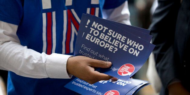 A campaigner hands out leaflets for 'Britain Stronger in Europe', the official 'Remain' campaign group seeking to avoid a Brexit outside Waterloo station, ahead of the forthcoming EU referendum in London on June 20, 2016. AFP PHOTO/JUSTIN TALLIS / AFP / JUSTIN TALLIS (Photo credit should read JUSTIN TALLIS/AFP/Getty Images)