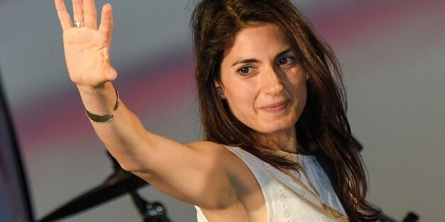 Virginia Raggi, Five Star Movement (M5S) candidate for the mayoral elections in Rome, speaks during her last campaign meeting on June 17, 2016 at Ostia Lido, Rome's seashore, before the second round of the election. Voters in the Italian capital return to the polls on June 19, 2016 for the second round of the mayoral elections opposing candidates Virginia Raggi, Five Star Movement (M5S) and Democratic Party (PD) Roberto Giachetti. / AFP / ANDREAS SOLARO (Photo credit should read ANDREAS SOLARO/AFP/Getty Images)