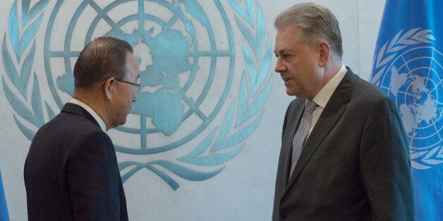 UNITED NATIONS HEADQUARTERS, NEW YORK, NY, UNITED STATES - 2016/01/04: Volodymyr Yelchenko (right) presents his credentials to Secretary-General Ban Ki-moon. The newly-installed Ukrainian Permanent Representative to the United Nations, Volodymyr Yelchenko presented his diplomatic credentials to Secretary-General Ban Ki-moon at a ceremony at United Nations Headquarters in New York City. (Photo by Albin Lohr-Jones/Pacific Press/LightRocket via Getty Images)