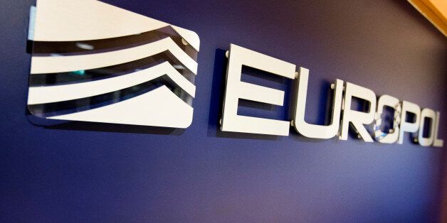 The Europol Logo in the Europol headquarters in The Hague, Netherlands, Tuesday, Nov. 24, 2015. (AP Photo/Jiri Buller)
