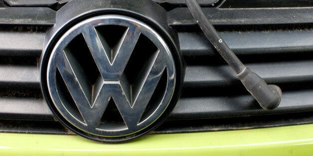 A Volkswagen (VW) logo is seen on a car's front at a scrapyard in Fuerstenfeldbruck, Germany, May 21, 2016. REUTERS/Michaela Rehle/File Picture