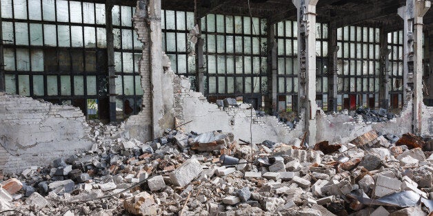 Abandoned destroyed factory building, industrial background