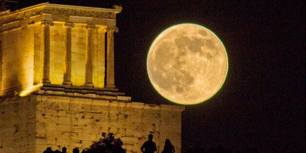 [UNVERIFIED CONTENT] This is the full moon in June 2013 or the 2013 Supermoon, as it rises next to the Apteros (Wingless) Nike temple, on the Acropolis of Athens.