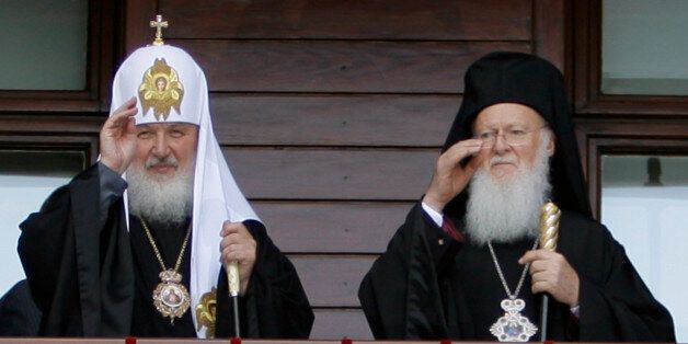 Newly elected Russian Orthodox Patriarch Kirill, left, and Istanbul Ecumenical Patriarch Bartholomew I gesture after they has led Sunday prayers in a show of unity at the patriarchal church of Aya Yorgi (St. George)in Istanbul, Turkey, Sunday, July 5, 2009. The churches in Istanbul and Moscow have been jostling for influence for years, but recently have pledged to overcome differences and achieve greater unity. Orthodox churches are largely autonomous, but the Istanbul-based Patriarchate is cons
