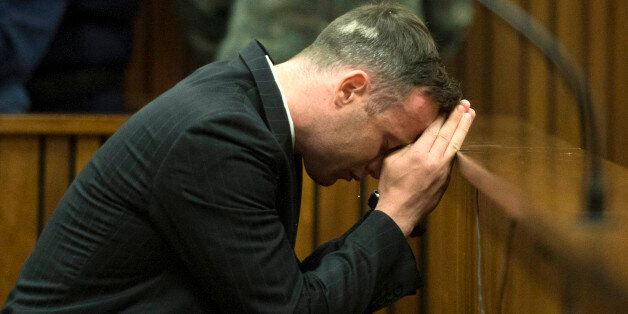 South African Paralympian Oscar Pistorius breaks down at the Pretoria High Court on June 14, 2016 on the second day of his pre sentencing hearing set to send him back to jail for murdering his girlfriend three years ago.The double-amputee killed Reeva Steenkamp, a model and law graduate, in the early hours of Valentine's Day in 2013, saying he mistook her for an intruder when he fired four times through the door of his bedroom toilet. / AFP / POOL / Deaan Vivier (Photo credit should read DEAAN VIVIER/AFP/Getty Images)