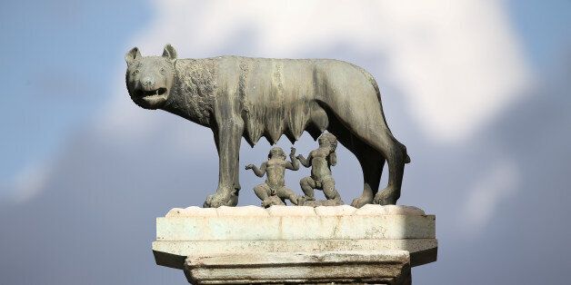 A bronze statue 'Romulus and Remus with She-Wolf' is seen in front of at the Rome's city hall,
