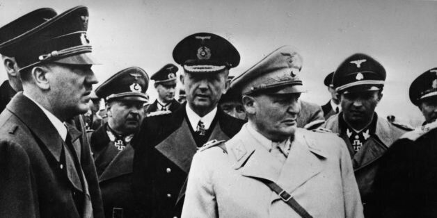 Admiral Karl Doenitz (1891 - 1980) commander of Hitler's U-boat fleet. To his right is Adolf Hitler and on his left Hermann Wilhelm Goering. Original Publication: Picture Post - 9258 - Is This Man Dangerous? - pub. 1954 Original Publication: People Disc - HD0138 (Photo by Picture Post/Getty Images)