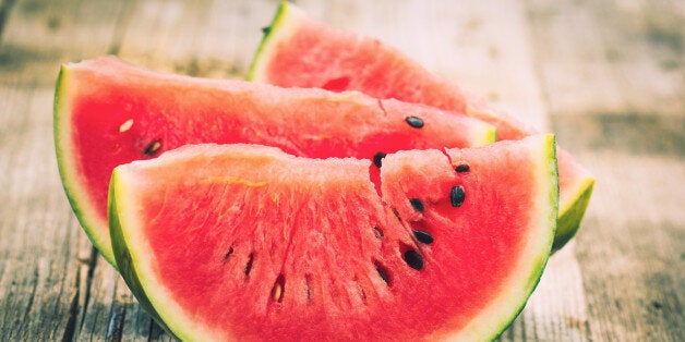 Watermelon slices on the wooden table