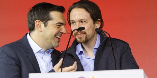 OMONIA SQUARE, ATHENS, ATTICA, GREECE - 2015/01/22: Alexis Tsipras (left), the leader of SYRIZA and the most promising candidate to be the next Prime Minister of Greece, talks with Pablo Iglesias TurriÃ³n (right), the leader of the Spanish Podemos party.SYRIZA (Coalition of the Radical Left), the leading party in the opinion polls, held their final election rally in Athens. (Photo by Michael Debets/Pacific Press/LightRocket via Getty Images)