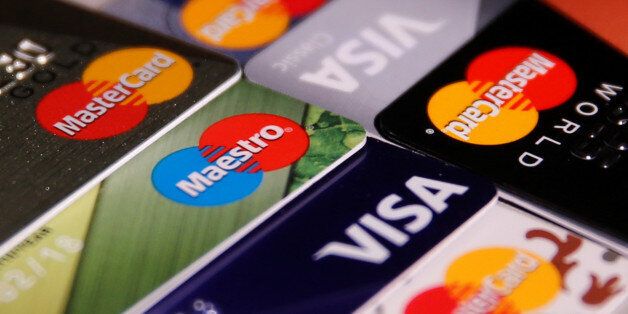 MasterCard, VISA and Maestro credit cards are seen in this picture illustration taken June 9, 2016. REUTERS/Maxim Zmeyev/Illustration