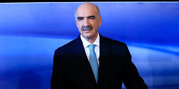 Vangelis Meimarakis, head of Greece's main opposition conservative New Democracy party, stands prior to a live televised debate with former Greek Prime Minister Alexis Tsipras and the leader of the left-wing Syriza party at the state-run ERT television in Athens, Monday, Sept. 14, 2015. Greece is holding a snap general election on Sept. 20, 2015. (AP Photo/Lefteris Pitarakis)