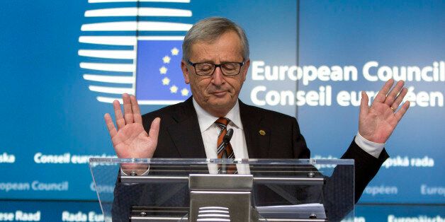 European Commission President Jean-Claude Juncker speaks during a media conference at an EU summit in Brussels on Friday, March 20, 2015. EU leaders on Friday are looking to back U.N.-brokered efforts to form a national unity government in conflict-torn Libya that may include a possible mission to help provide security. (AP Photo/Virginia Mayo)
