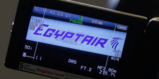 FILE PHOTO - The company logo is displayed on a video camera screen at the Egyptair desk at Charles de...