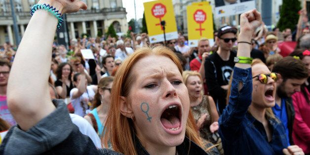 Pro-choice campaigners march on June 18, 2016, in Warsaw, Poland, against proposed changes to Poland's restrictive abortion law that would effectively ban terminations in the EU country of 38 million people. / AFP / JANEK SKARZYNSKI (Photo credit should read JANEK SKARZYNSKI/AFP/Getty Images)