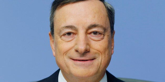 The President of the European Central Bank Mario Draghi waits for the beginning of a news conference in Frankfurt, Germany, Thursday, Jan. 21, 2016, following a meeting of the ECB governing council. (AP Photo/Michael Probst)