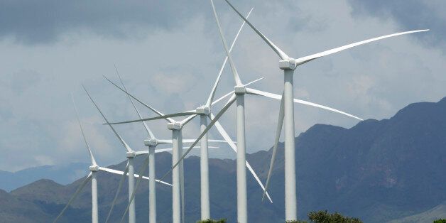 FILE- In this file photo dated Tuesday, Nov. 10, 2015, wind turbines in Penonome, Panama, as the Central American country seeks to gradually reduce its dependence on fossil fuels. A U.N.-backed report released Thursday March 24, 2016, says global investments in solar, wind and other sources of renewable energy reached a record $286 billion last year, and the developing world accounted for the majority of investment for the first time. (AP Photo/Arnulfo Franco, FILE)