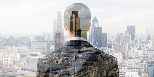 Double exposure of a business man looking towards the financial district of the City of London with the Heron Tower, Tower 42 and the Gherkin.