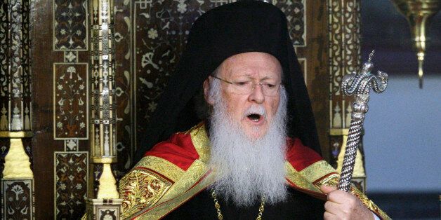 Ecumenical Orthodox Patriarch Bartholomew I, conducts the Christmas Mass in the Patriarchate's St. George (Aya Yorgi) Church, in Istanbul, Turkey, Friday, Dec. 25, 2009. (AP Photo/Ibrahim Usta)