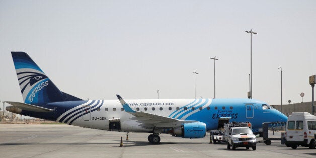 Workers service an Egyptair flight at International Cairo Airport, Egypt May 21, 2016. REUTERS/Amr Abdallah Dalsh