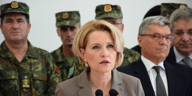 TIRANA, ALBANIA - JUNE 1: Mimi Kodheli is the Minister of Defense of Albania speaks as 30 Albanian Army soldiers to participate in 'Decisive support' mission in Afghanistan stand before departing with Turkish Air Force aircraft from Tirana International Airport Nene Tereza in Tirana, Albania on June 1, 2015. (Photo by Olsi Shehu/Anadolu Agency/Getty Images)