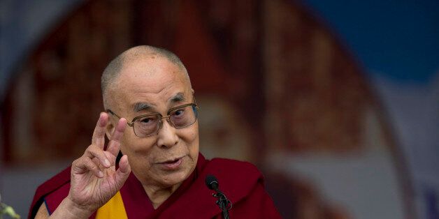 Tibetan spiritual leader the Dalai Lama speaks during a celebration to mark the 100 years of Tibetan Medical and Astrological Institute in Dharamsala, India, Wednesday, March 23, 2016. The institute, called Men-Tsee-Khang in Tibetan, was founded in 1916 by the 13th Dalai Lama in Lhasa. After his exile, the 14th Dalai Lama reestablished the institute in 1961 in India. (AP Photo /Tsering Topgyal)
