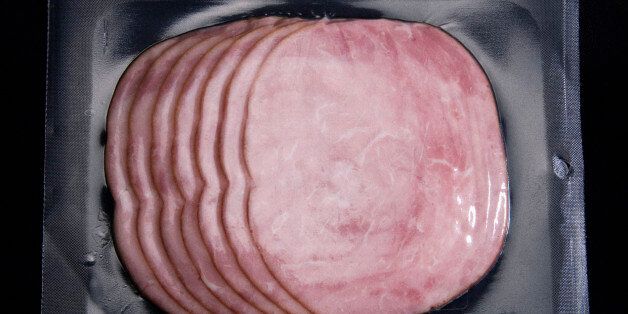 Sliced ham in plastic wrapping