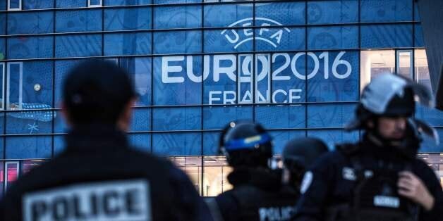 Policemen take part in a mock suicide attack exercise as part of security measures for the upcoming Euro 2016 football championship, at the Parc Olympique Lyonnais stadium in Decines-Charpieu, near Lyon, central-eastern France, on May 30, 2016. / AFP / JEFF PACHOUD (Photo credit should read JEFF PACHOUD/AFP/Getty Images)