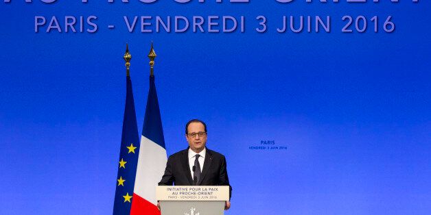 French President Francois Hollande delivers his speech at the opening of an international meeting in a bid to revive the Israeli-Palestinian peace process in Paris, France, Friday, June 2, 2016. U.S., European and Arab diplomats meet in Paris for a French-led effort to revive the Mideast peace process, despite skepticism from Israel. (AP Photo/Kamil Zihnioglu, Pool)