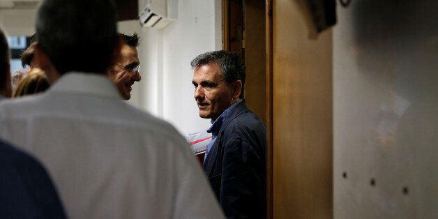 Greek Finance Minister Euclid Tsakalotos arrives for a news conference at the ministry in Athens, Greece May 26, 2016. REUTERS/Alkis Konstantinidis