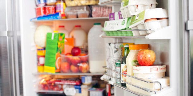 Open fridge full of groceries