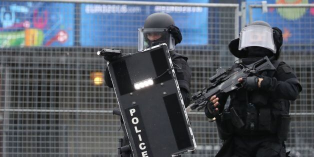Members of the Raid special intervention unit of the French police take part in a terrorist attack mock exercise on May 31, 2016 near the Stade de France in Saint-Denis, France. France said on May 25 it will deploy more than 90,000 police and security guards for Euro 2016, vowing to do 'everything possible to avoid a terrorist attack' during the football tournament that starts next month. / AFP / KENZO TRIBOUILLARD (Photo credit should read KENZO TRIBOUILLARD/AFP/Getty Images)
