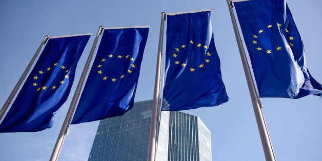 FRANKFURT AM MAIN, GERMANY - APRIL 21: The stars of the European Union (EU) on banners in front of the headquarters of the European Central Bank (ECB) pictured on April 21, 2016 in Frankfurt am Main, Germany. (Photo by Thomas Lohnes/Getty Images)