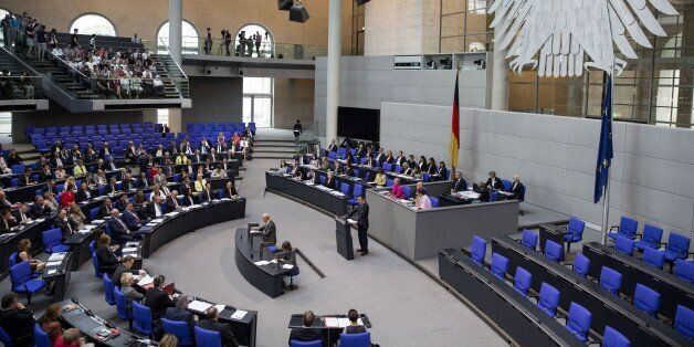 BERLIN, GERMANY - JUNE 2: German MPs are seen after German MPs approved the Armenian 'genocide' resolution at the German Parliament (Bundestag) in Berlin, Germany on June 2, 2016. The resolution refers to the deportation of Armenians without reference to the deaths of Muslim Ottomans during World War I. (Photo by Mehmet Kaman/Anadolu Agency/Getty Images)