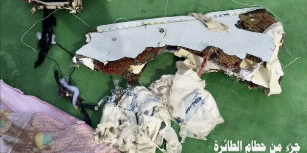 Recovered debris of the EgyptAir jet that crashed in the Mediterranean Sea is seen with the Arabic caption