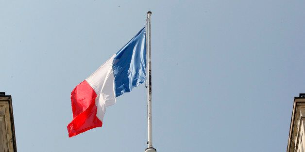 PARIS, FRANCE - MAY 25: French flag flies on the top of the Elysee Presidential Palace on May 25, 2016 in Paris, France. The French Government confirms that it tapped into its strategic reserves of petroleum products and said the equivalent of three days of inventory of 115 available had been used until now. the French government is facing a serious crisis following the El Khomri law. (Photo by Chesnot/Getty Images)