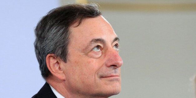 Mario Draghi, president of the European Central Bank (ECB), pauses during a news conference to announce the bank's interest rate decision in Vienna, Austria, on Thursday, June 2, 2016. The European Central Bank kept its stimulus program unchanged and said it will start buying corporate bonds next week, as measures announced two months ago kick in. Photographer: Krisztian Bocsi/Bloomberg via Getty Images