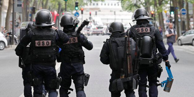 Special intervention French gendarmes and police arrive at the scene of an operation in Paris, France, May 26, 2016. REUTERS/Benoit Tessier