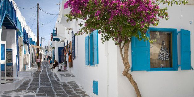 Traditional buildings on Mykonos street, Cyclades Islands, Greece