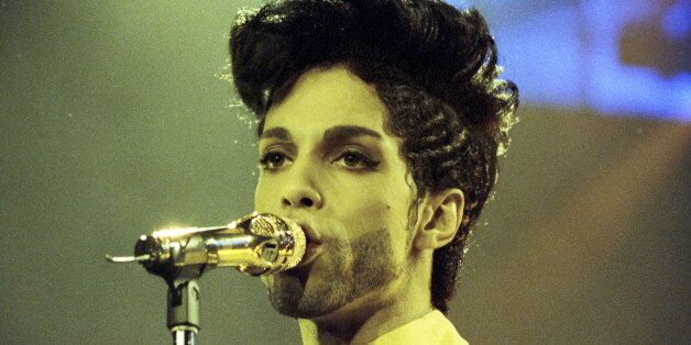 Prince performs during his 'Diamonds and Pearls Tour' at the Earl's Court Arena in London, Britain, June 15, 1992. REUTERS/Dylan Martinez