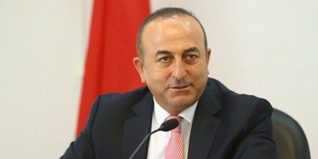 KIGALI, RWANDA - MAY 31: Turkish Foreign Minister Cavusoglu and Minister of Foreign Affairs and Cooperation of Rwanda Louise Mushikiwabo (not seen) hold a press conference after their meeting in Kigali, Rwanda on May 31, 2016. (Photo by Fatih Aktas/Anadolu Agency/Getty Images)