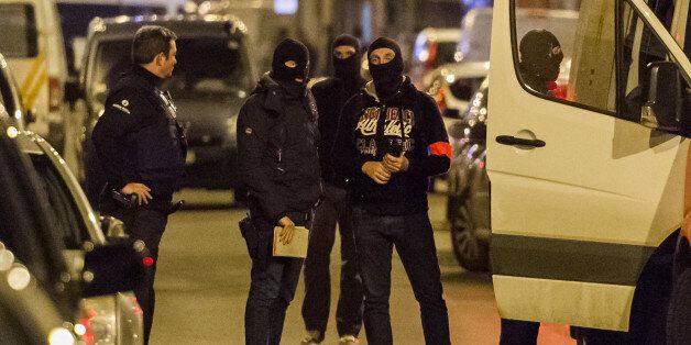 Police investigate an area where terror suspect Mohamed Abrini was arrested earlier today, in Brussels on Friday April 8, 2016. The federal prosecutor's office confirmed a fugitive suspect in the Nov. 13 Paris attacks was arrested in Belgium on Friday, after a raid Belgian authorities said was linked to the deadly March 22 Brussels bombings. The suspect, Mohamed Abrini, is believed to be the mysterious