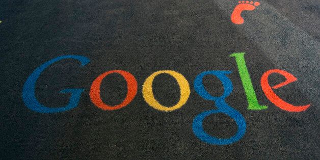The Google logo is printed on the carpet during the inauguration of the new Google cultural institute in Paris, Tuesday, Dec. 10, 2013. Franceâs culture minister has snubbed the launch of Googleâs latest project, the Paris-based Cultural Institute Lab, over a row about privacy. (AP Photo/Jacques Brinon)