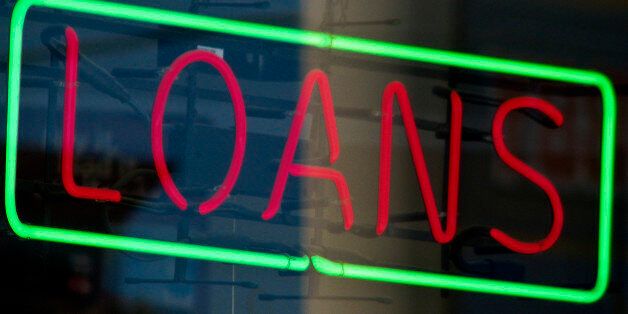 during economic crisis, this red and green neon LOANS sign in a retail window was one of many seen all over Houston
