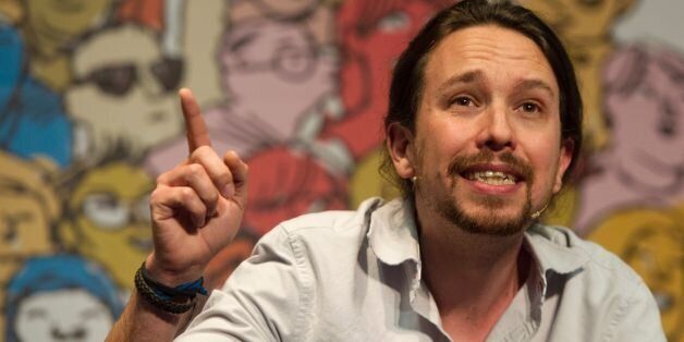 Leader of left wing party Podemos Pablo Iglesias speaks during 'The Congress on your Square' meeting held at El Pozo cultural center in Vallecas, a neighborhood of Madrid on May 11, 2016. / AFP / CURTO DE LA TORRE (Photo credit should read CURTO DE LA TORRE/AFP/Getty Images)
