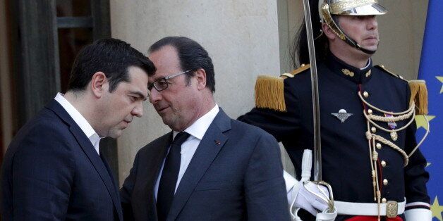 French President Francois Hollande speaks with Greek Prime Minister Alexis Tsipras as he leaves the Elysee palace in Paris, France, April 13, 2016. REUTERS/Philippe Wojazer