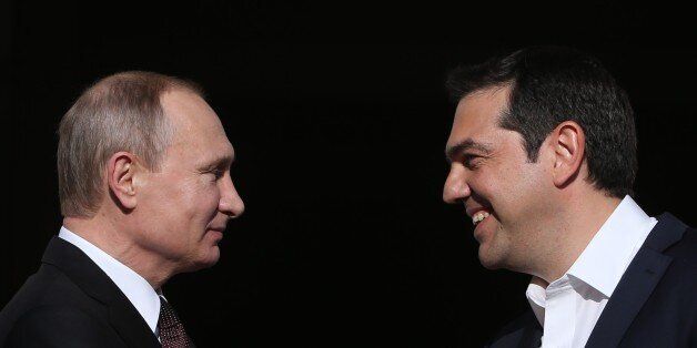 ATHENS, GREECE - MAY 27: (RUSSIA OUT) Russian President Vladimir Putin (L) shakes hands with Prime Minister of Greece Alexis Tsipras (R) during their meeting in Athens, Greece, May 27, 2016. Vladimir Putin is having a state visit to Greece. (Photo by Mikhail Svetlov/Getty Images)