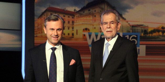 Norbert Hofer of Austria's Freedom Party, FPOE, and Alexander Van der Bellen, candidate of the Austrian Greens, from left, wait for the start of a TV debate in Vienna, Austria, Thursday, May 19, 2016. Europeans of all political stripes are focusing this weekend on Austrian elections that have significance far beyond the small EU nationâs borders. (AP Photo/Ronald Zak)