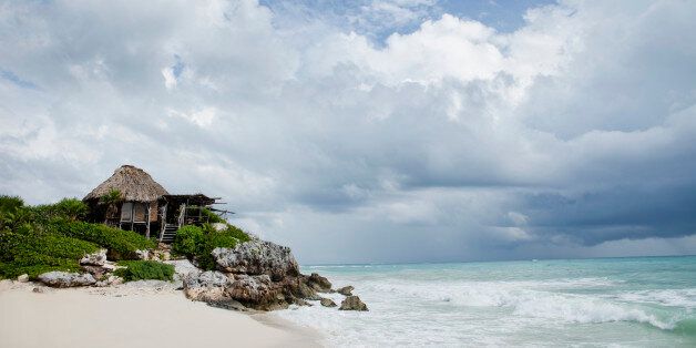 Eco beach bungalow on sandy beach on Caribbean Sea